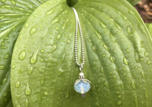 Load image into Gallery viewer, Silver Translucent White and tiny pearl Flower Necklace on raindrop leaf. The ghost of a flower.